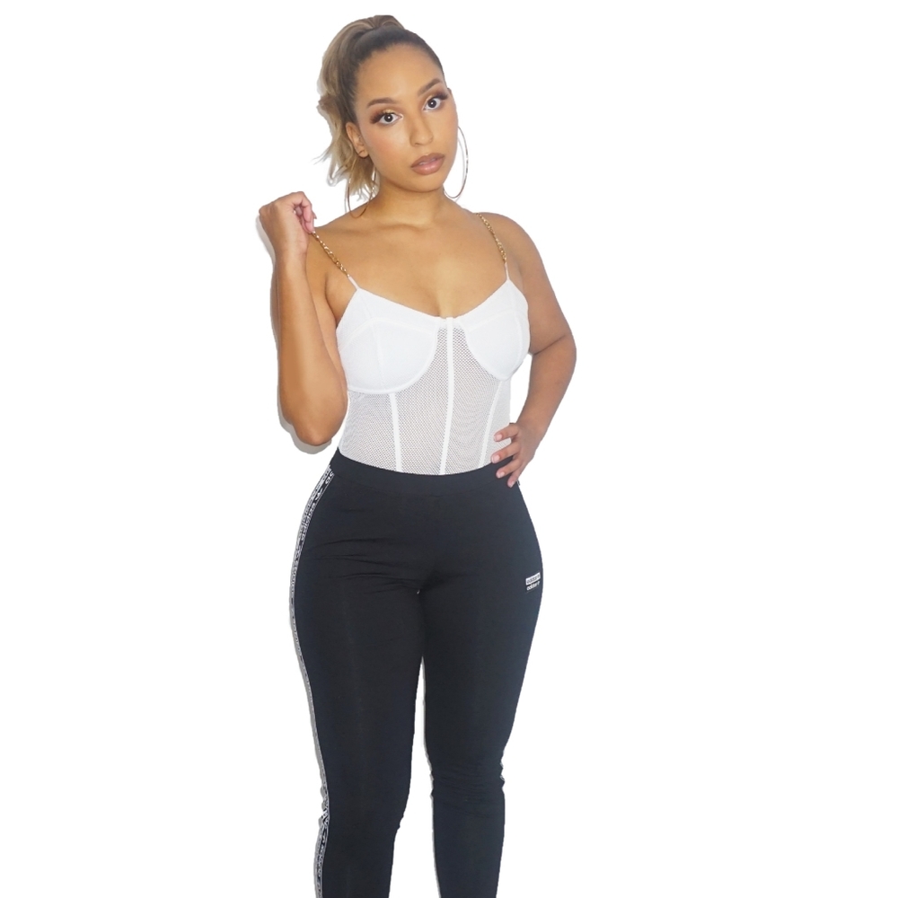 White fishnet body suit